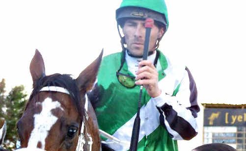Winning jockey Chris Whiteley returns to scale on Easy Play. Winning jockey Chris Whiteley returns to scale on Easy Play.